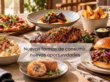 Mesa con costillar asado, carrilleras, ensaladilla y otros platos de hostelería